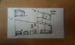 A napkin sketch of a simple house cross-section with a skillion roof, bedrooms at the low end and living space at the high end and low internal walls to allow light through